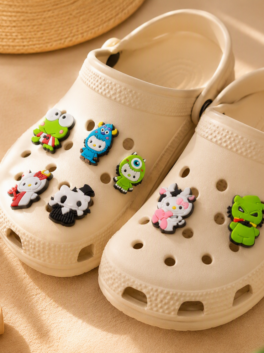 Beige clogs decorated with various Sanrio character shoe charms