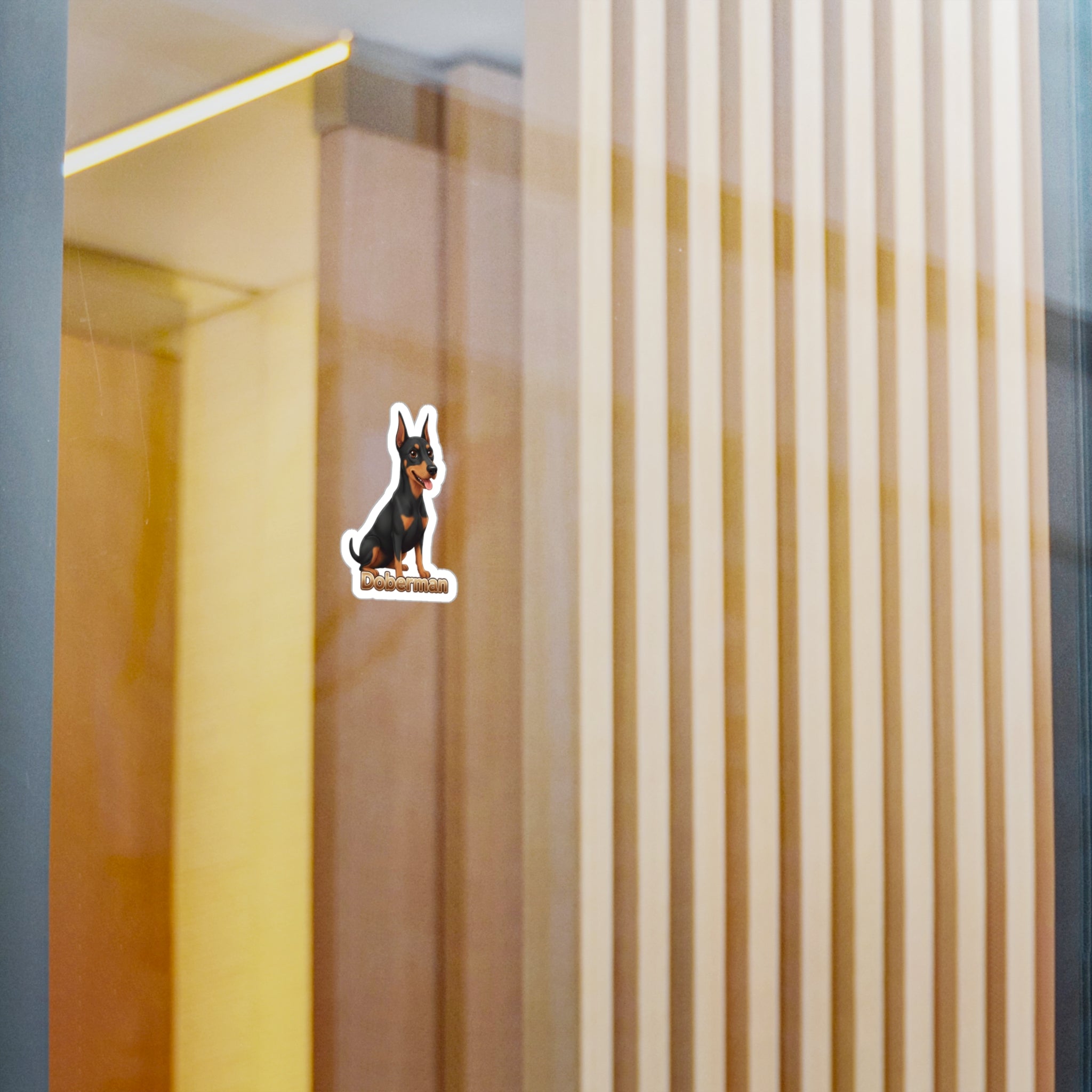 Doberman dog vinyl decal sticker on a glass surface