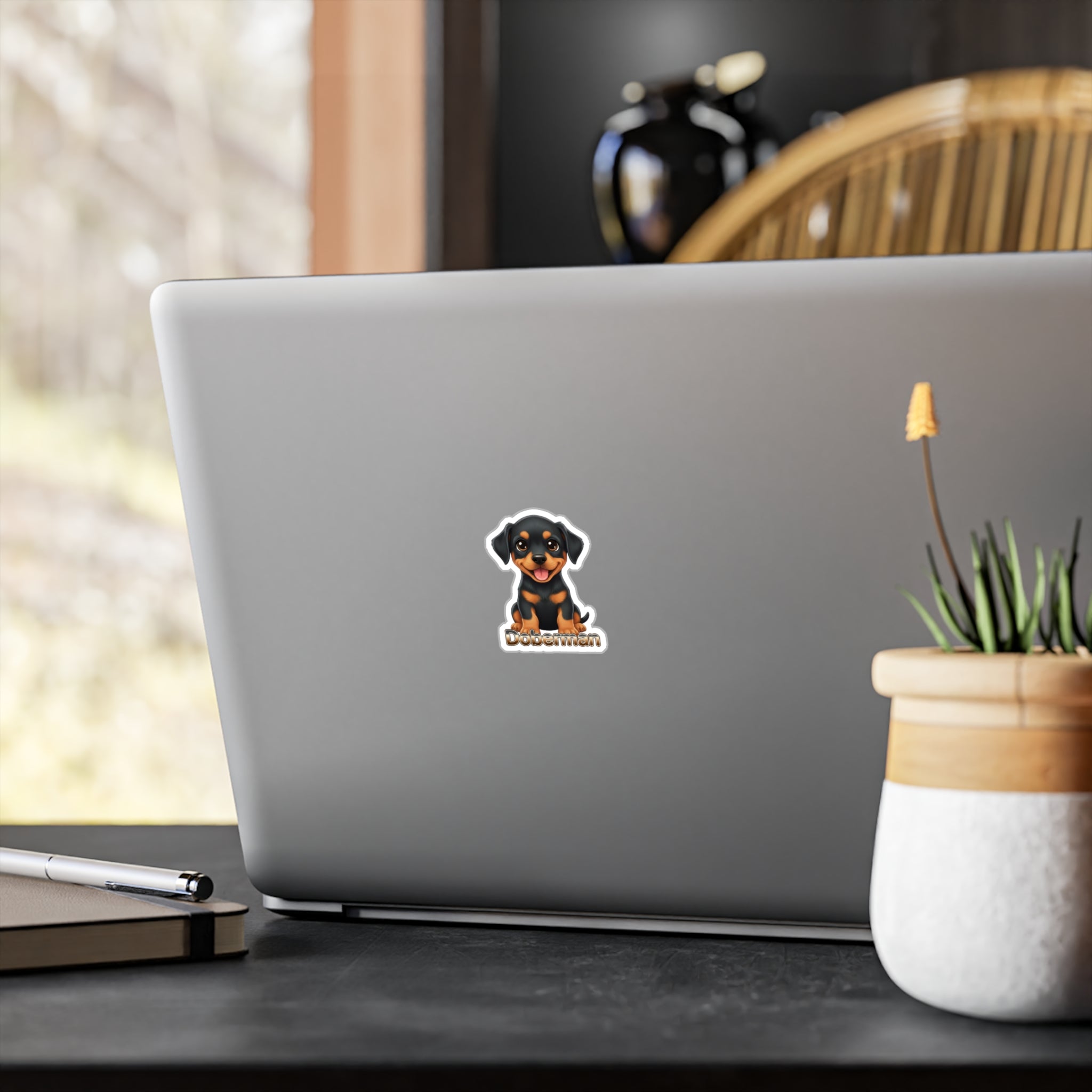 Doberman dog puppy vinyl decal sticker on a laptop lid