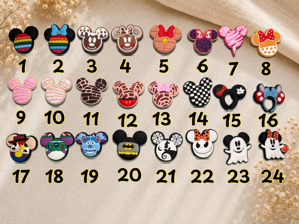 Twenty four numbered Mouse Ears shoe charms featuring various character and food designs