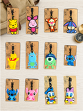Collection of twelve cartoon character Monsters luggage tags on display cards