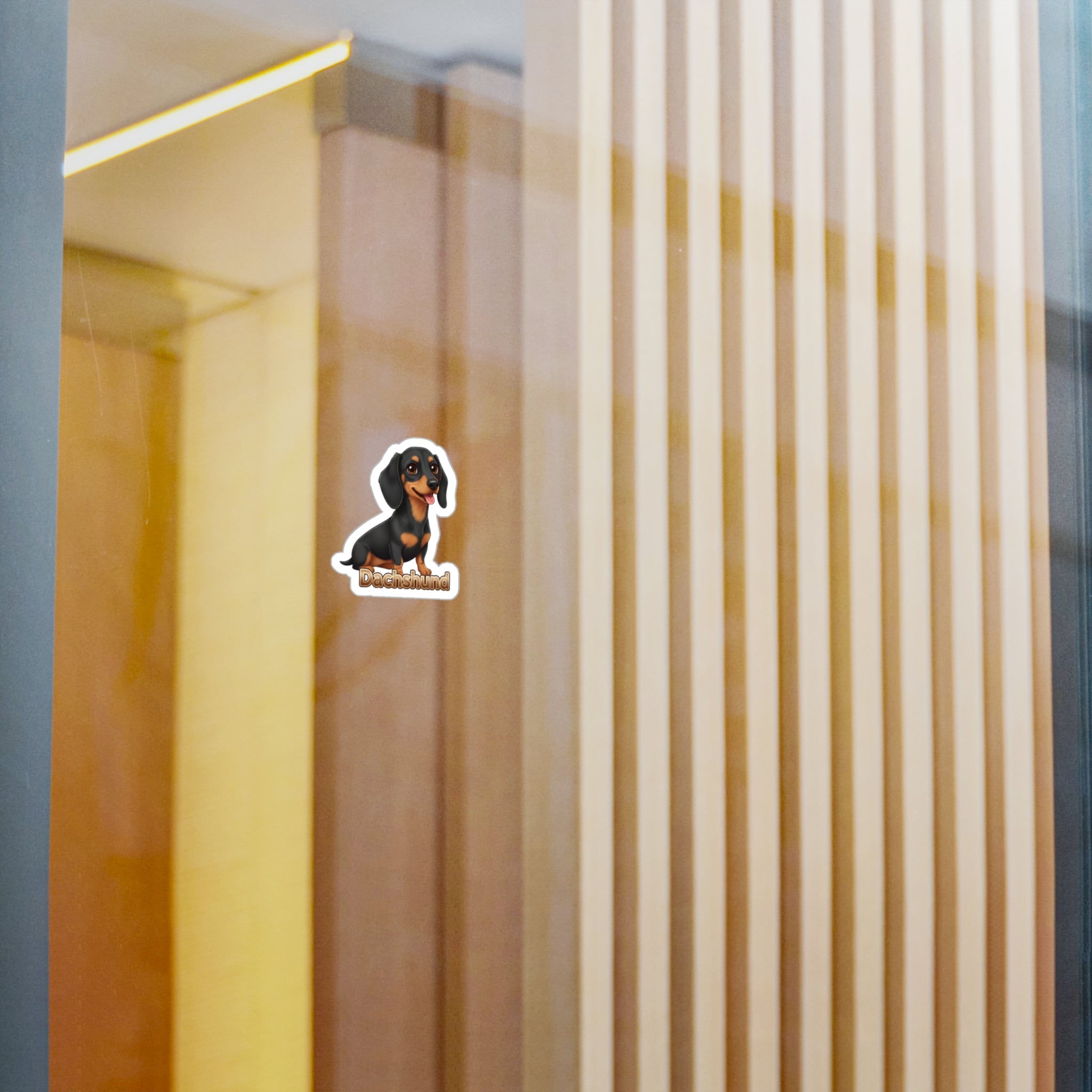 Dachshund dog vinyl decal sticker on a glass surface