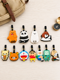 Assorted cartoon character Bear Luggage Tags arranged on a wooden surface