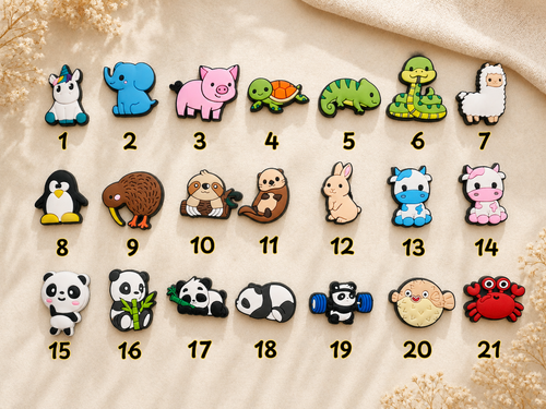 Numbered grid of twenty one assorted animal shoe charms
