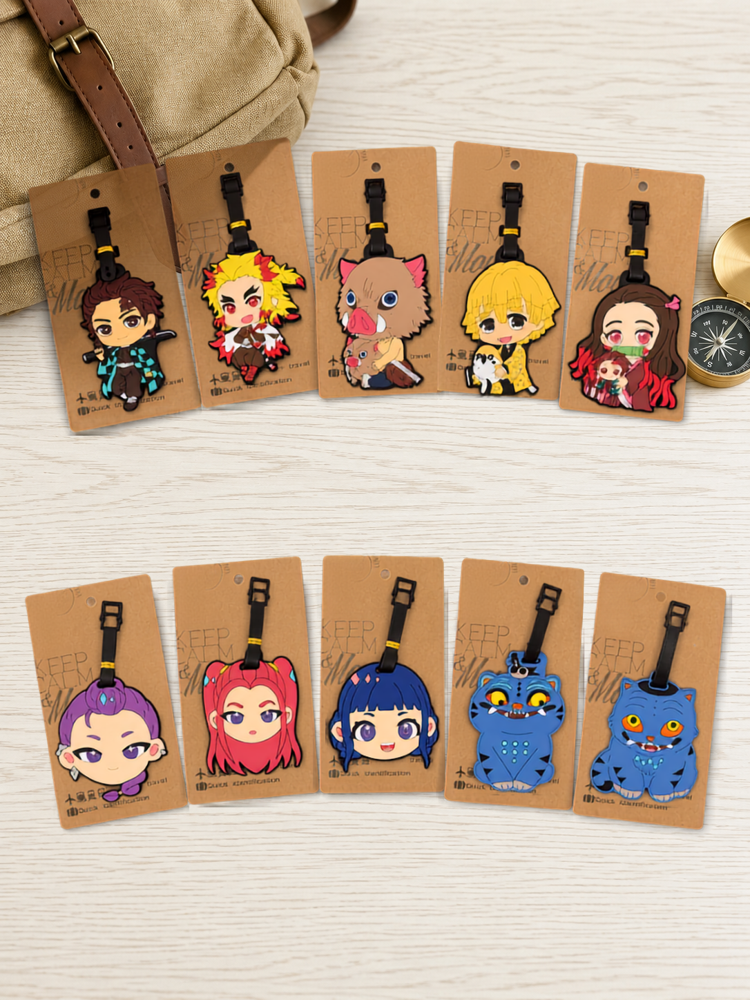 Ten assorted anime character luggage tags on cardboard backing