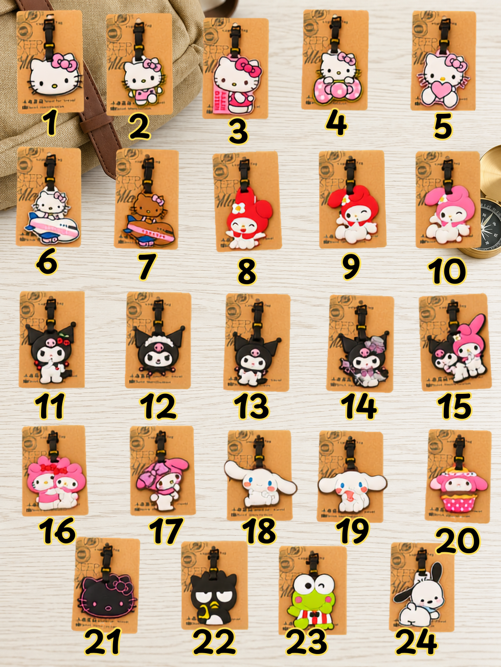 Selection of twenty four character themed Kitty luggage tags arranged in a grid